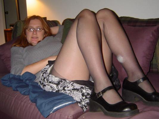 Slutty torn black pantyhose