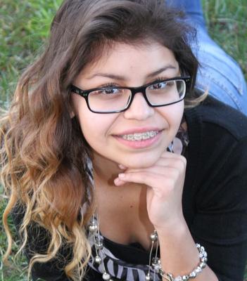 Cute Teen with Braces and Glasses