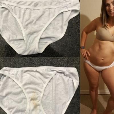 Allison posant et exhibant une culotte blanche tachée de pisse.