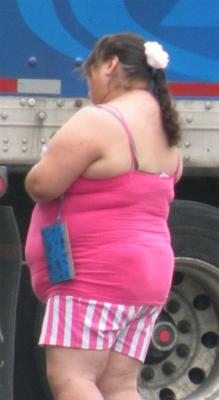 Huge Belly Latin Woman in pink, total ball of a hottie