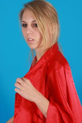 Michelle dropping red blouse in studio