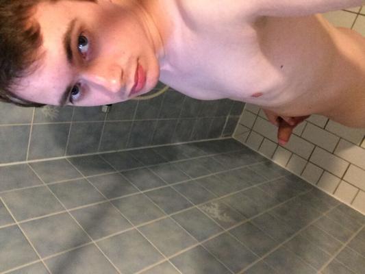 Teen boy pissing in the shower