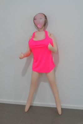 Big tit inflatable doll in pink.