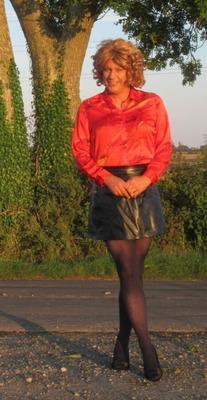 Nicola in Red Blouse & Black PVC Skirt