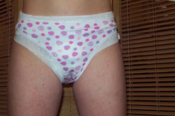 Teen girl in diaper with panties