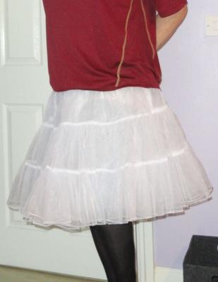 Eine Crossdresserin im Petticoat