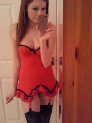 Cute redhead with perky tits dressed in lingerie