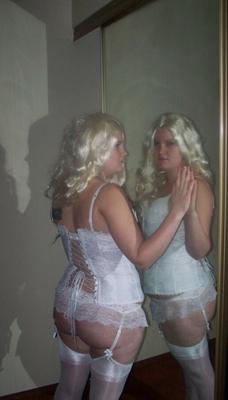 Crystal in her white corset. Save and Spread