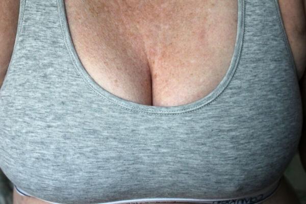 Flashing my big old  year old tits to get you hard