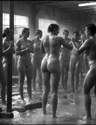 Female miners taking their group shower together after work