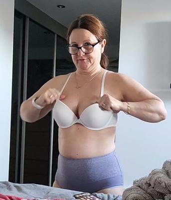 Mature chubby milf in her bra, want her to take any off? 