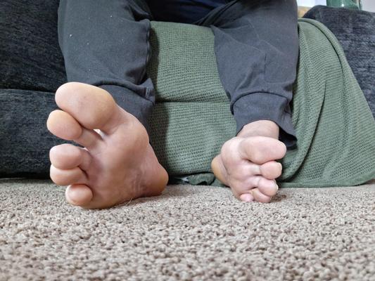 Barefoot feet soles up close